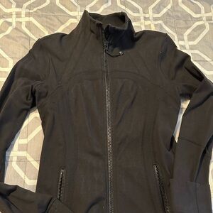 Lululemon define jacket in black but has some white designs